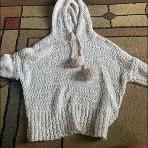 Crocheted sweater with a hood